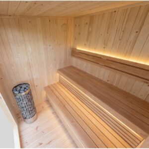 Interno della sauna FRAME Lux Premium 235 con panche a due livelli, schienale illuminato e stufa elettrica